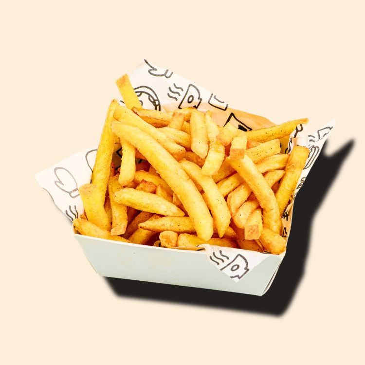 Golden crispy French fries served at Ubud Fried Chicken